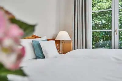 Ein Bett oder Betten in einem Zimmer der Unterkunft Hotel Freisinger Hof