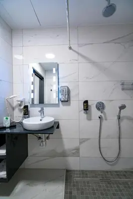 Ein Badezimmer in der Unterkunft Hotel Kreis Residenz München