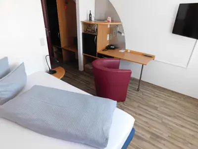 TV/Unterhaltungsangebot in der Unterkunft Hotel KonradP Holzkirchen