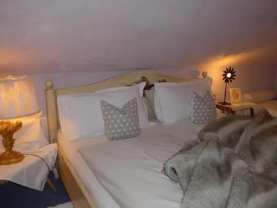 Ein Bett oder Betten in einem Zimmer der Unterkunft Romantische 5-Sterne- Ferienwohnungen