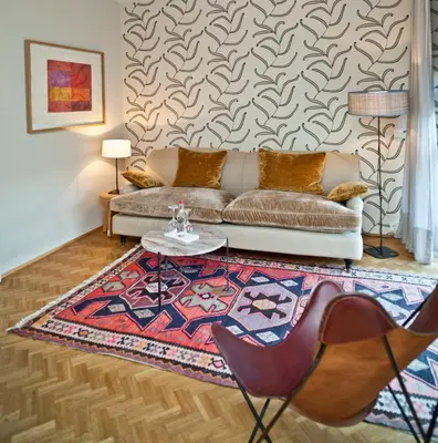 Ein Sitzbereich in der Unterkunft CORTIINA Hotel