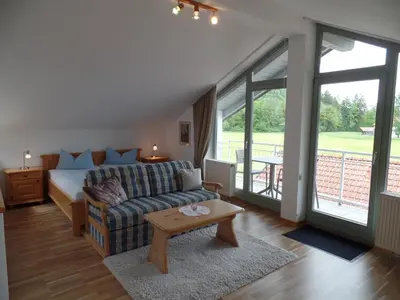Ein Sitzbereich in der Unterkunft Ferienwohnung Brünnsteinblick Kranzhorn
