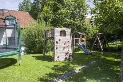 Ein Kinderspielbereich in der Unterkunft Ferienwohnung Brünnsteinblick Kranzhorn