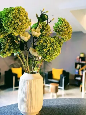Ein Sitzbereich in der Unterkunft Hotel Herian