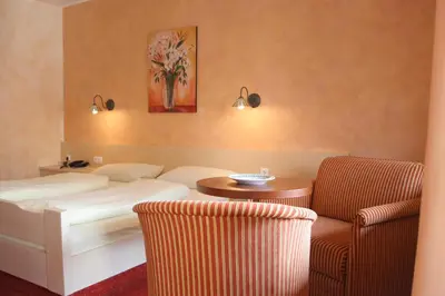 Ein Bett oder Betten in einem Zimmer der Unterkunft Hotel Keindl