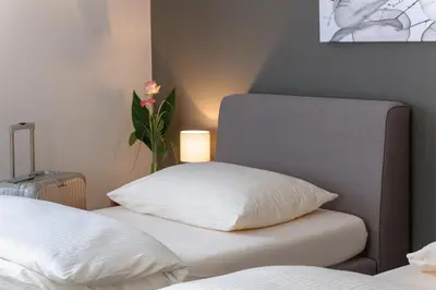 Ein Bett oder Betten in einem Zimmer der Unterkunft sleepIN