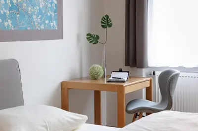 Ein Bett oder Betten in einem Zimmer der Unterkunft sleepIN