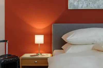 Ein Bett oder Betten in einem Zimmer der Unterkunft sleepIN