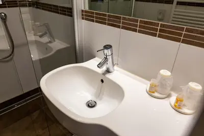 Ein Badezimmer in der Unterkunft Hotel Schyrenhof