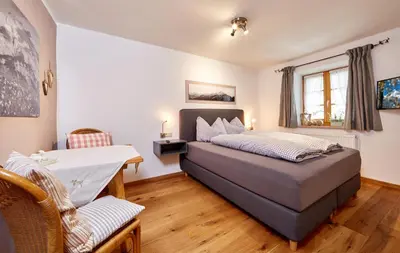 Ein Bett oder Betten in einem Zimmer der Unterkunft Ferienwohnung Graseck