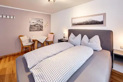 Ein Bett oder Betten in einem Zimmer der Unterkunft Ferienwohnung Graseck