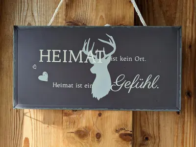 Ein Zertifikat, Auszeichnung, Logo oder anderes Dokument, das in der Unterkunft Lieblingsort ausgestellt ist