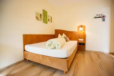 Ein Bett oder Betten in einem Zimmer der Unterkunft Gasthaus und Hotel Göttler Josef