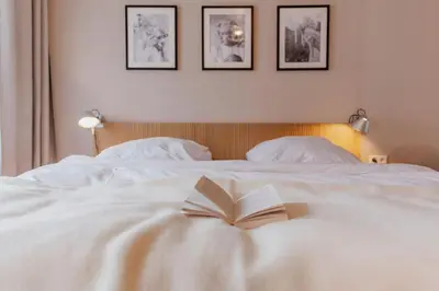 Ein Bett oder Betten in einem Zimmer der Unterkunft Hotel Lux