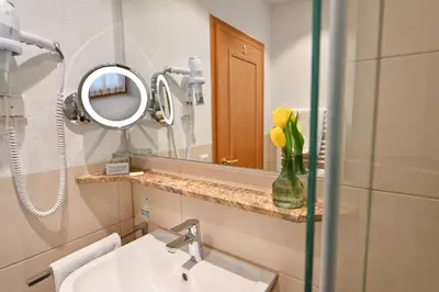Ein Badezimmer in der Unterkunft Gasthaus - Hotel Alt Fürstätt