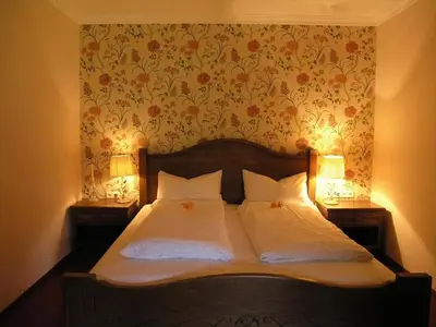 Ein Bett oder Betten in einem Zimmer der Unterkunft Hotel Bachmair Alpina