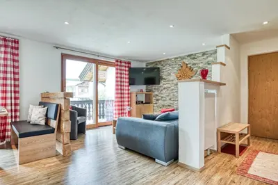 Ein Sitzbereich in der Unterkunft Gästehaus Alpina