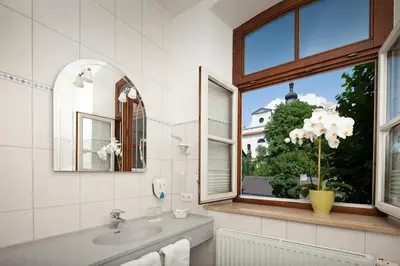 Ein Badezimmer in der Unterkunft Hotel Angerbräu