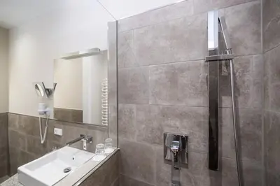 Ein Badezimmer in der Unterkunft Hotel Angerbräu
