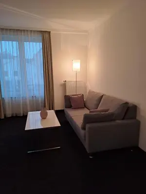Ein Sitzbereich in der Unterkunft Hotel & Apart4you