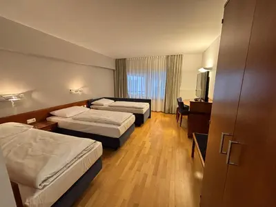 Ein Bett oder Betten in einem Zimmer der Unterkunft Hotel & Apart4you