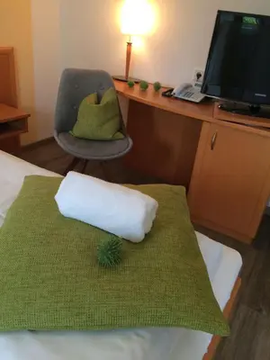 Ein Bett oder Betten in einem Zimmer der Unterkunft Landgasthof & Landhotel Wild