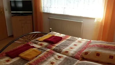 Ein Bett oder Betten in einem Zimmer der Unterkunft Ferienwohnung Baur