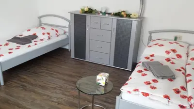 Ein Bett oder Betten in einem Zimmer der Unterkunft Ferienwohnung Baur