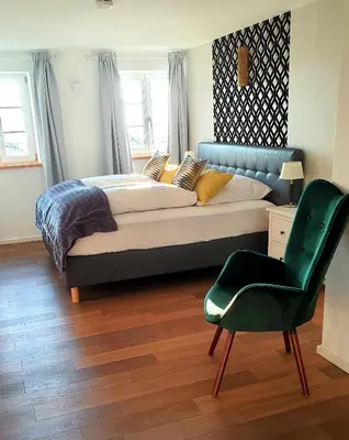 Ein Bett oder Betten in einem Zimmer der Unterkunft Schatzbergalm Pension