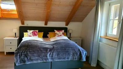 Ein Bett oder Betten in einem Zimmer der Unterkunft Schatzbergalm Pension