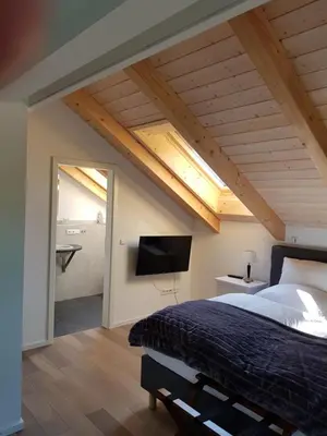 Ein Bett oder Betten in einem Zimmer der Unterkunft Schatzbergalm Pension