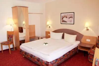 Ein Bett oder Betten in einem Zimmer der Unterkunft Hotel Gasthof Krone