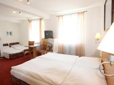 Ein Bett oder Betten in einem Zimmer der Unterkunft Hotel Gasthof Krone