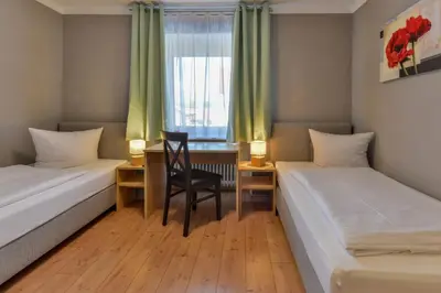 Ein Bett oder Betten in einem Zimmer der Unterkunft Hotel Gasthof Krone
