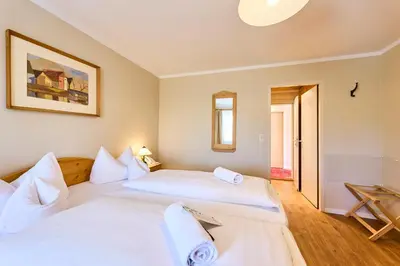 Ein Bett oder Betten in einem Zimmer der Unterkunft Hotel Waldgasthof Buchenhain