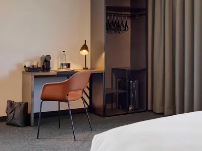 Ein Bett oder Betten in einem Zimmer der Unterkunft B&B Hotel München-Moosach