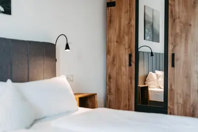 Ein Bett oder Betten in einem Zimmer der Unterkunft Hotel Garni Kern