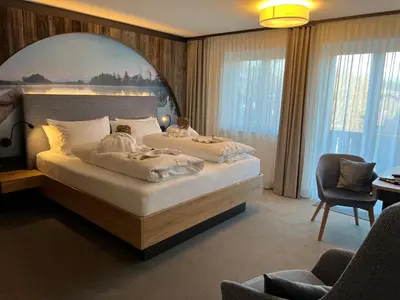Ein Bett oder Betten in einem Zimmer der Unterkunft Pension Seeblick