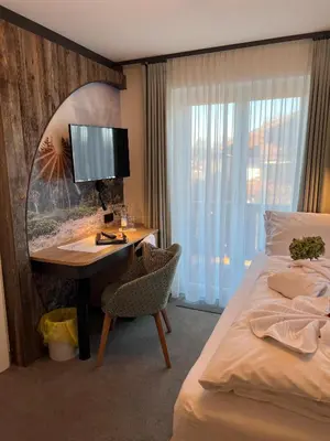 Ein Bett oder Betten in einem Zimmer der Unterkunft Pension Seeblick