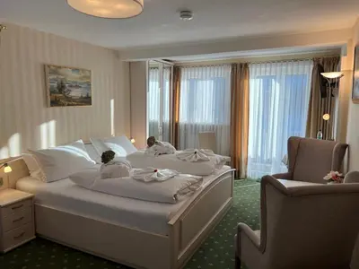 Ein Bett oder Betten in einem Zimmer der Unterkunft Pension Seeblick