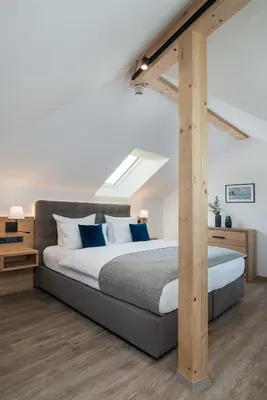 Ein Bett oder Betten in einem Zimmer der Unterkunft Hotel Obermaier