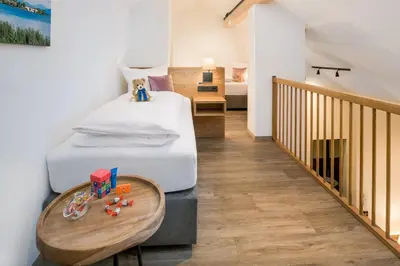 Ein Bett oder Betten in einem Zimmer der Unterkunft Hotel Obermaier