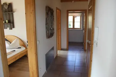 Ein Bett oder Betten in einem Zimmer der Unterkunft Ferienwohnung Panoramablick