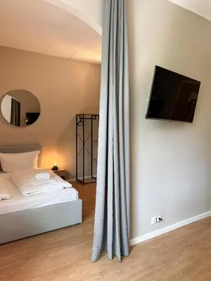 Ein Bett oder Betten in einem Zimmer der Unterkunft Hotel Sendlinger Tor
