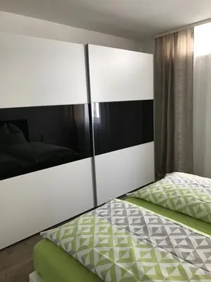 Ein Bett oder Betten in einem Zimmer der Unterkunft City Apartment
