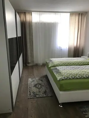 Ein Bett oder Betten in einem Zimmer der Unterkunft City Apartment