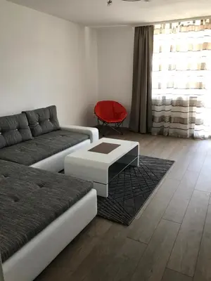 Ein Sitzbereich in der Unterkunft City Apartment