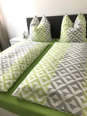 Ein Bett oder Betten in einem Zimmer der Unterkunft City Apartment