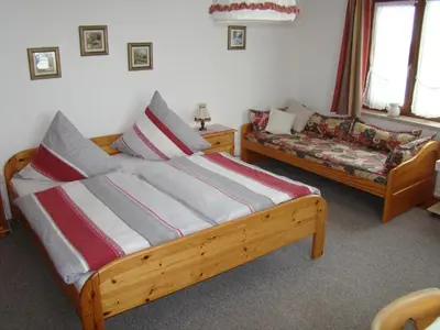 Ein Bett oder Betten in einem Zimmer der Unterkunft Gästehaus St. Bartholomä