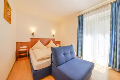 Ein Bett oder Betten in einem Zimmer der Unterkunft Hotel Waldhof